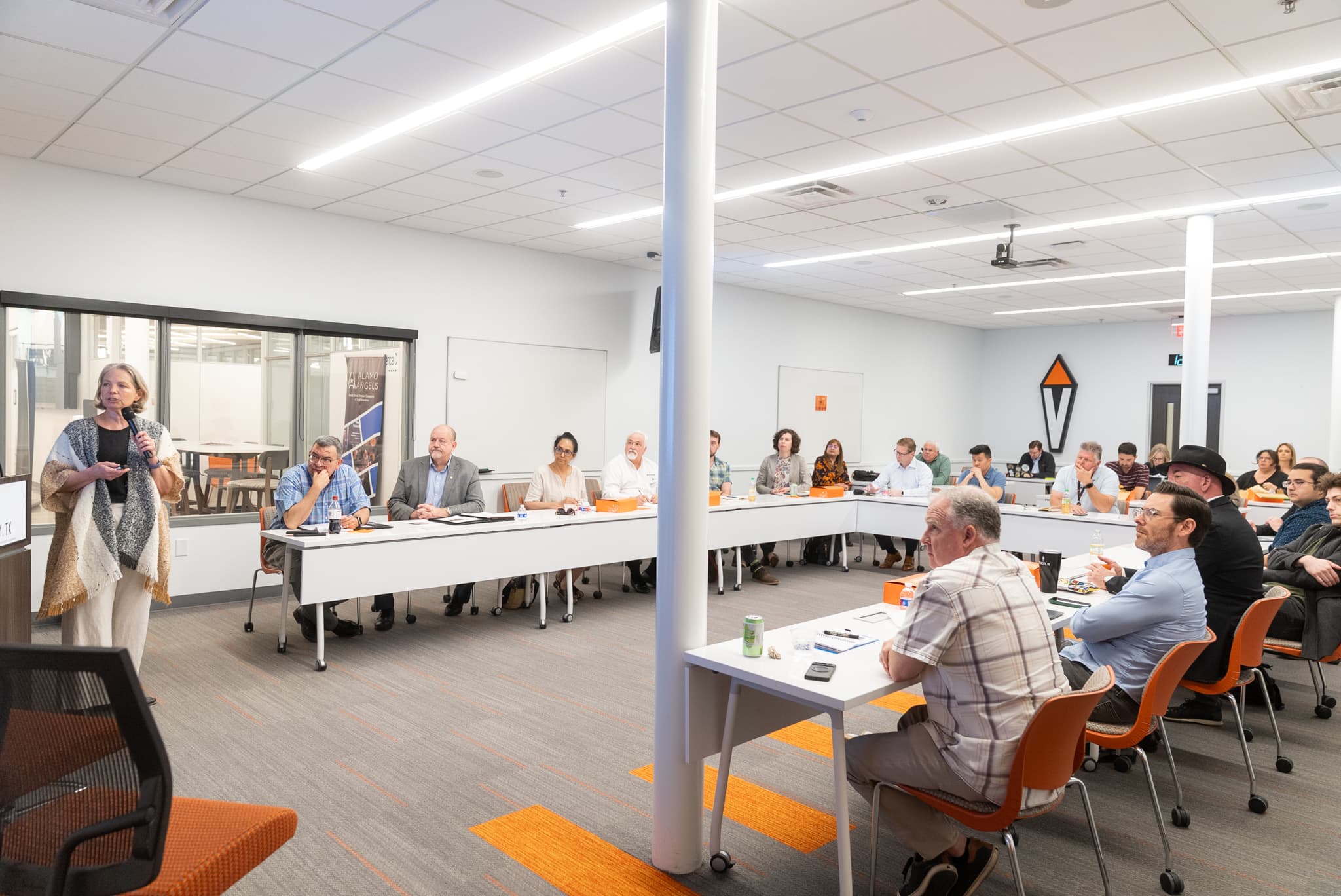Pre-conference symposium participants engaging in collaborative discussion